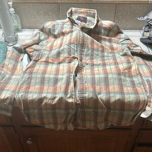 One small plaid shirt